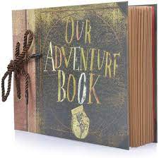 A picture of a scrapbook titled 'My Adventure Book'.